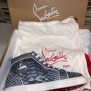 Christian LouBoutin python men’s sneakers.